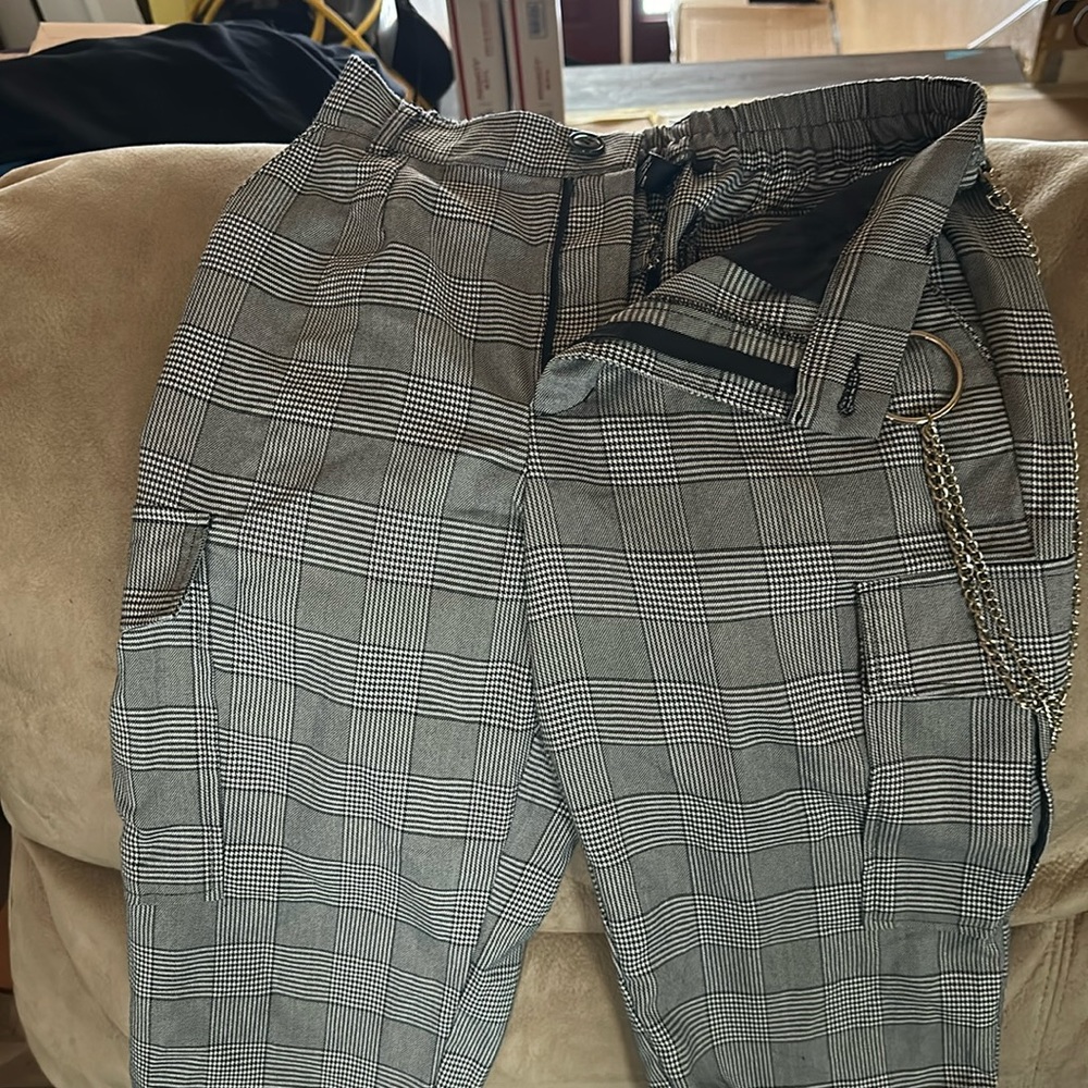 Womans Medium, pants with chain (removable) hardly worn.